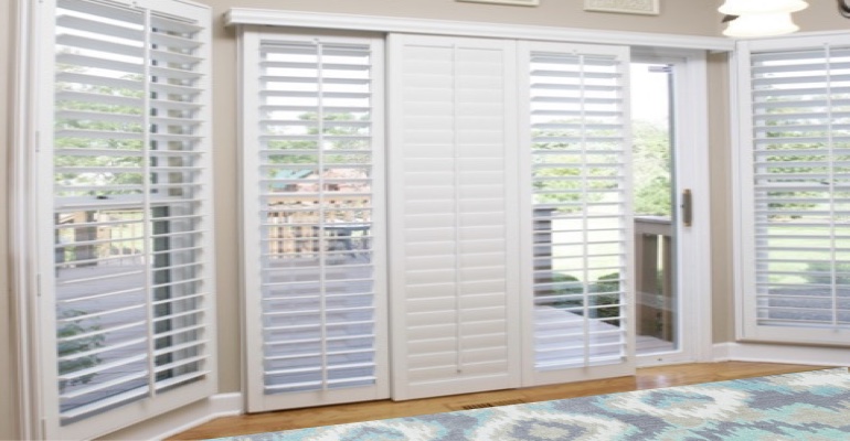 [Polywood|Plantation|Interior ]211] shutters on a sliding glass door in Jacksonville
